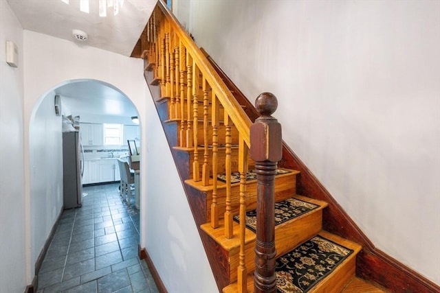 12 Charles St, Brockton, MA 02301 - stairway with arched walkways and baseboards