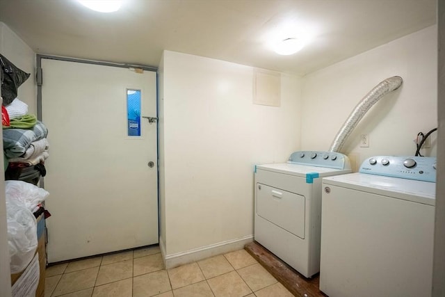 12 Charles St, Brockton, MA 02301 - laundry area featuring washer and dryer and light tile patterned floors
