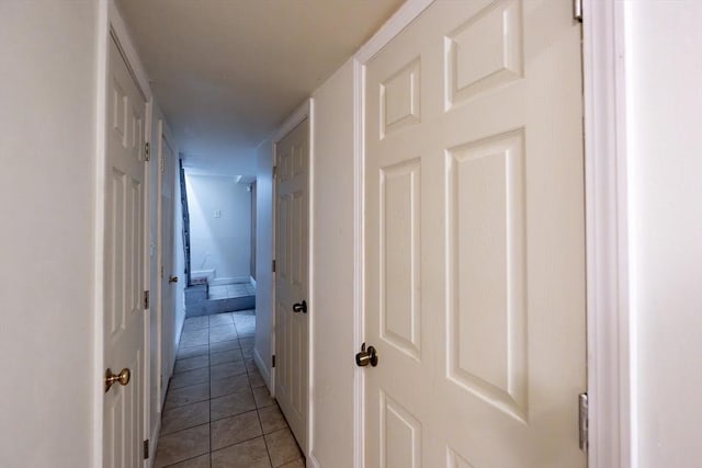 12 Charles St, Brockton, MA 02301 - hall with light tile patterned flooring and baseboards