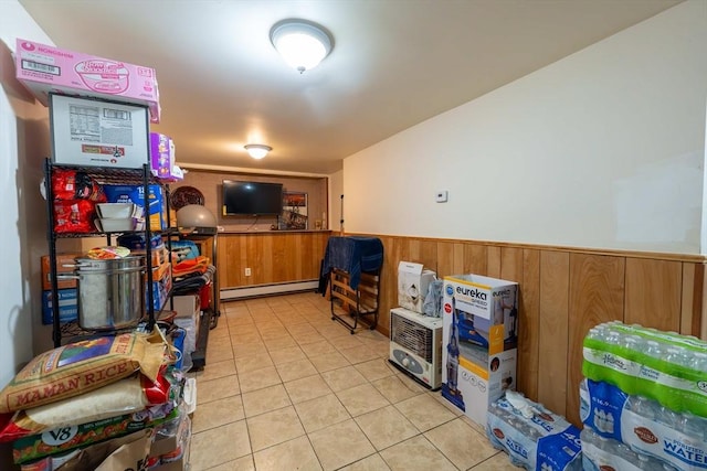 12 Charles St, Brockton, MA 02301 - interior space with a baseboard radiator, a wainscoted wall, light tile patterned floors, and wooden walls