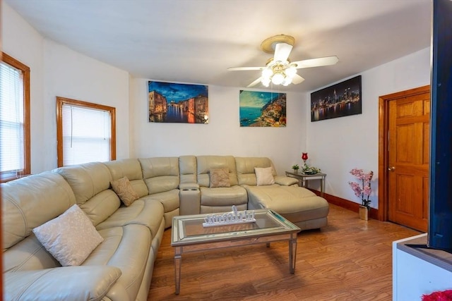 12 Charles St, Brockton, MA 02301 - living area featuring ceiling fan, light wood-style flooring, and baseboards