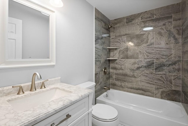 full bath featuring toilet, bathing tub / shower combination, and vanity