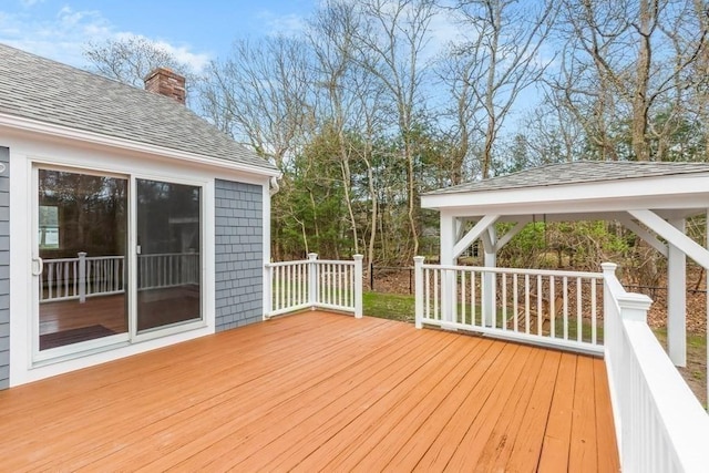 wooden terrace with a gazebo