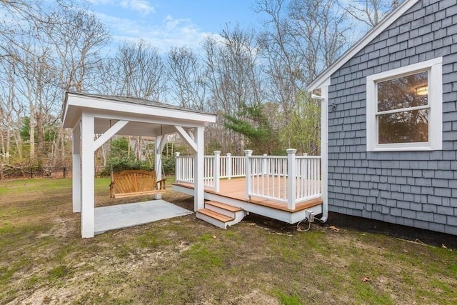 view of yard with a gazebo and a wooden deck