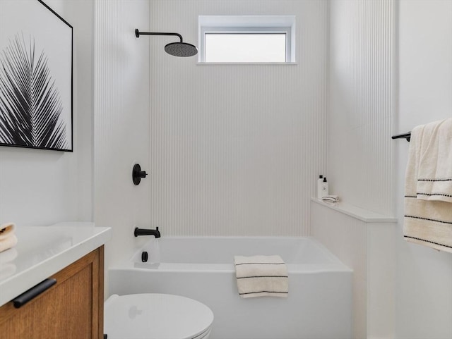full bath with toilet, vanity, and tub / shower combination