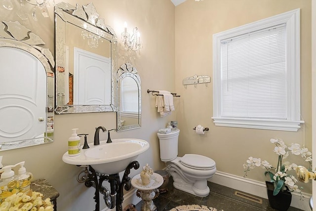30 Bridle Path, Shrewsbury, MA 01545 - bathroom with baseboards, toilet, and visible vents