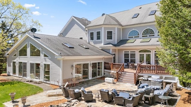 30 Bridle Path, Shrewsbury, MA 01545 - rear view of house with french doors, a deck, a patio area, outdoor lounge area, and a shingled roof