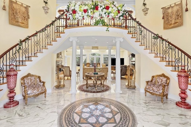 30 Bridle Path, Shrewsbury, MA 01545 - entryway featuring ornate columns, marble finish floor, and stairway
