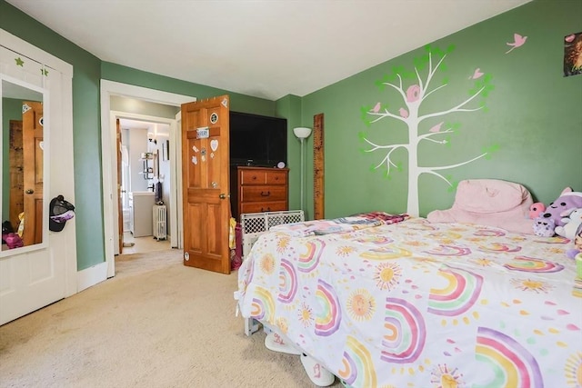 carpeted bedroom featuring radiator heating unit