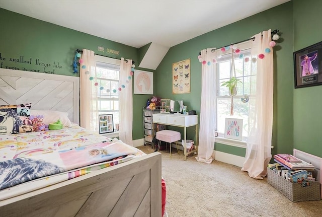 carpeted bedroom with baseboards