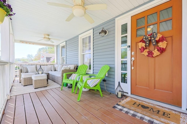 exterior space featuring a porch and a ceiling fan