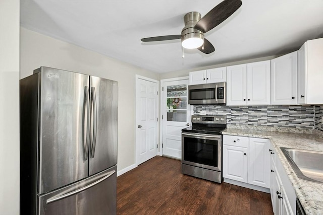 15 Dodge Hill Rd, Sutton, MA 01590 - kitchen featuring appliances with stainless steel finishes, dark wood-type flooring, white cabinetry, and ceiling fan