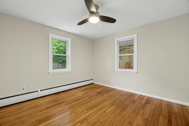15 Dodge Hill Rd, Sutton, MA 01590 - empty room with a baseboard radiator, light wood-type flooring, baseboards, and a ceiling fan