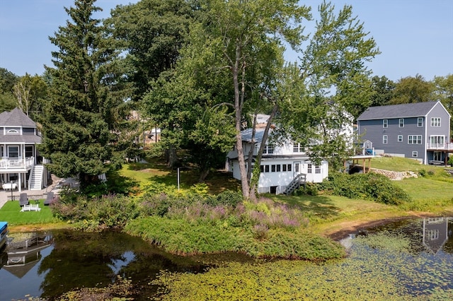 exterior space with a water view