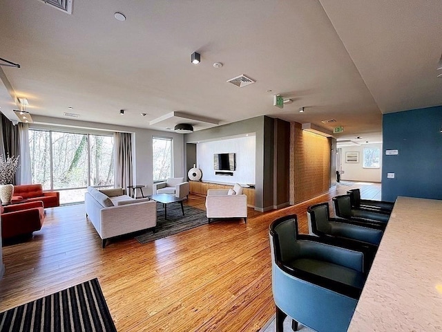 99 Tremont Unit 205, Boston, MA 02135 - living area with light wood-style floors