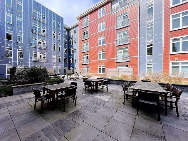 99 Tremont Unit 205, Boston, MA 02135 - view of patio featuring outdoor dining space
