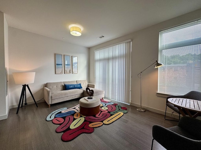 99 Tremont Unit 205, Boston, MA 02135 - living area featuring wood finished floors and healthy amount of natural light