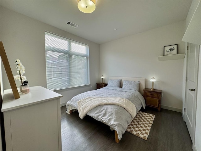 99 Tremont Unit 205, Boston, MA 02135 - bedroom featuring dark wood-type flooring
