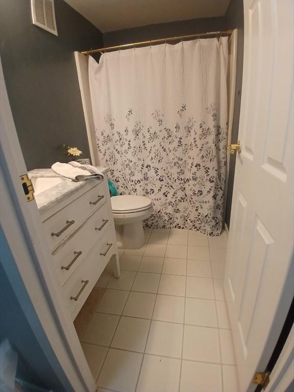 474 Revere Beach Blvd Unit 205, Revere, MA 02151 - bathroom featuring vanity, tile patterned flooring, toilet, and a shower with curtain