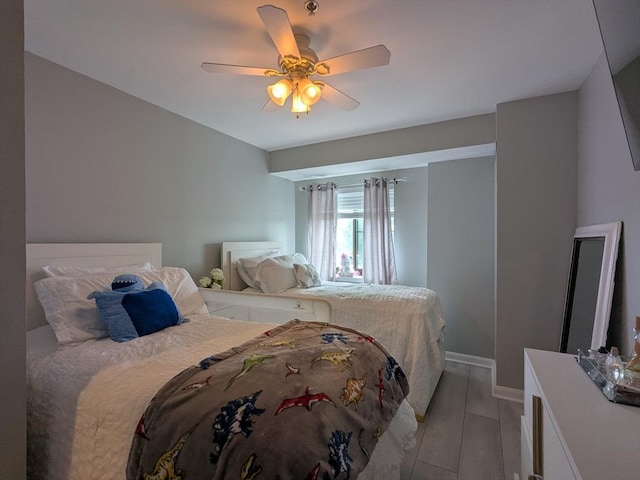 474 Revere Beach Blvd Unit 205, Revere, MA 02151 - bedroom featuring light wood-style flooring, baseboards, and ceiling fan