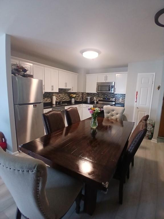 474 Revere Beach Blvd Unit 205, Revere, MA 02151 - dining room featuring light wood-type flooring