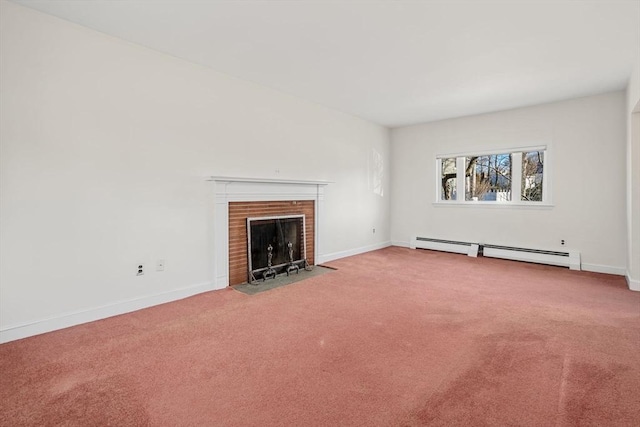 unfurnished living room with a baseboard radiator, a fireplace, and carpet flooring