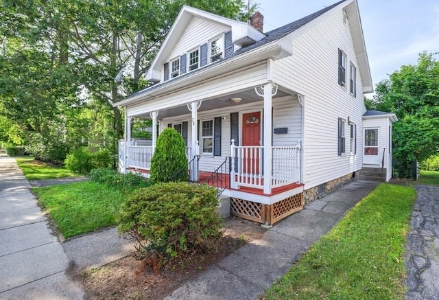 24 Tampa St, Worcester, MA 01604 - view of front of house featuring covered porch and a chimney