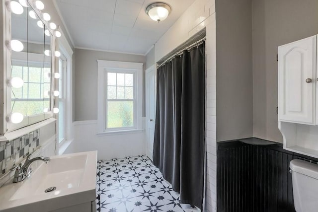 24 Tampa St, Worcester, MA 01604 - bathroom with a wainscoted wall, tile patterned floors, a shower with shower curtain, vanity, and ornamental molding