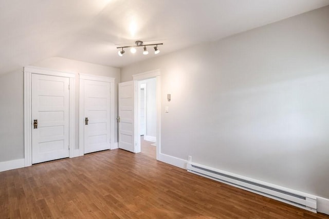 24 Tampa St, Worcester, MA 01604 - unfurnished bedroom featuring a baseboard radiator and wood finished floors