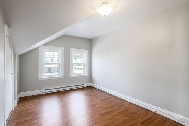 24 Tampa St, Worcester, MA 01604 - bonus room featuring a baseboard radiator, vaulted ceiling, and wood finished floors