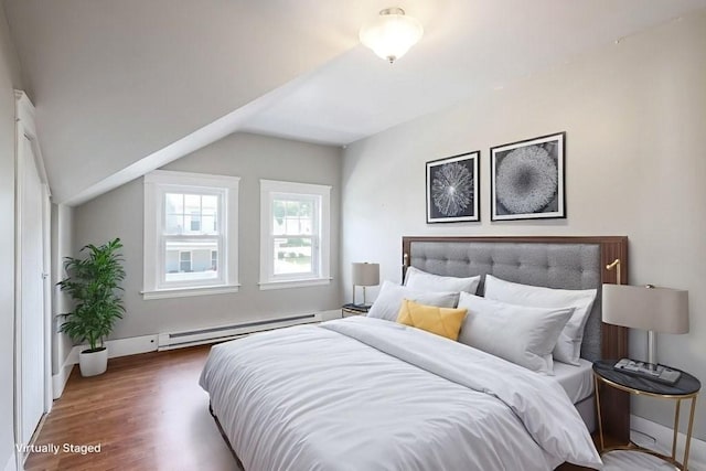 24 Tampa St, Worcester, MA 01604 - bedroom with baseboard heating, wood finished floors, and vaulted ceiling