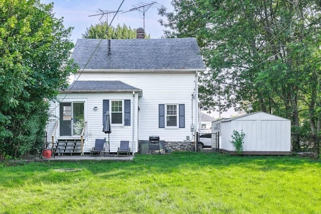24 Tampa St, Worcester, MA 01604 - back of property with a chimney, a gate, roof with shingles, and entry steps