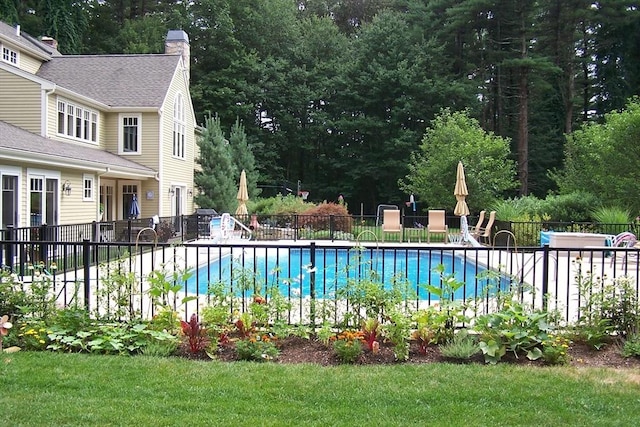 view of pool featuring a fenced in pool, a patio, and fence