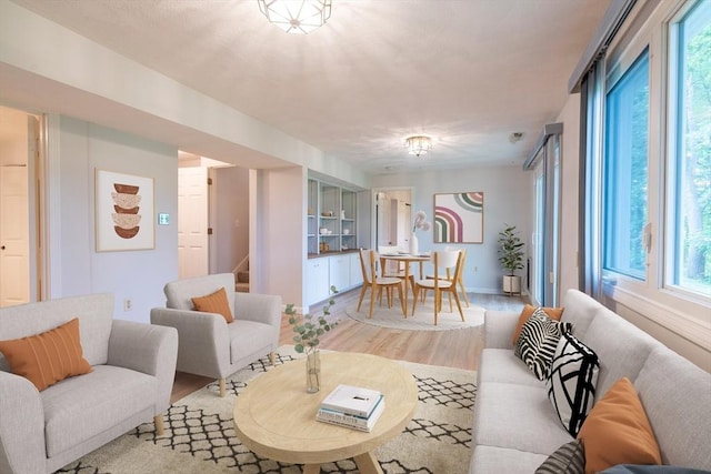 87 Fifer Ln Unit 87, Lexington, MA 02421 - living area featuring wood finished floors and stairway