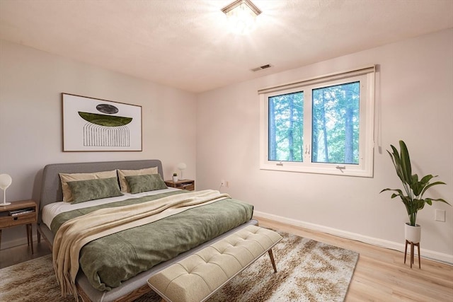 87 Fifer Ln Unit 87, Lexington, MA 02421 - bedroom featuring light wood-type flooring and baseboards