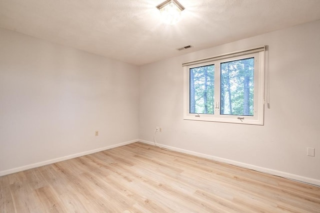 87 Fifer Ln Unit 87, Lexington, MA 02421 - spare room with light wood-style flooring and baseboards