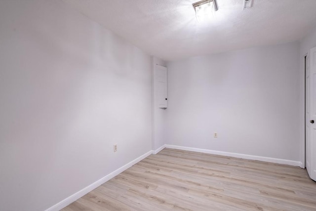 87 Fifer Ln Unit 87, Lexington, MA 02421 - empty room featuring light wood finished floors and baseboards