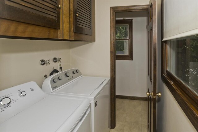 27 Chestnut Hill, South Hadley, MA 01075 - laundry area featuring washing machine and clothes dryer and tile patterned flooring