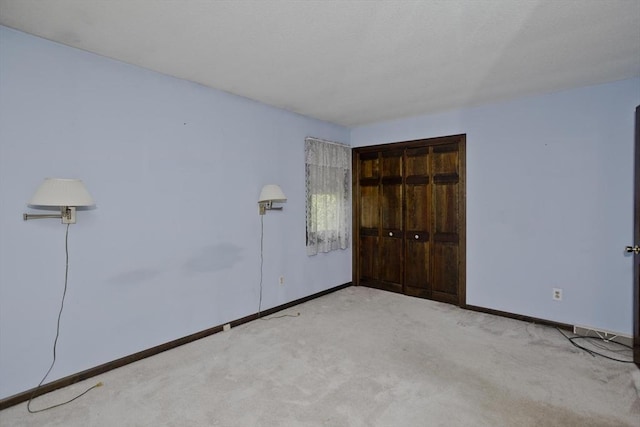 27 Chestnut Hill, South Hadley, MA 01075 - unfurnished bedroom featuring a closet and carpet flooring
