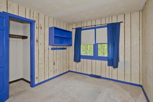 27 Chestnut Hill, South Hadley, MA 01075 - spare room with carpet floors and wooden walls