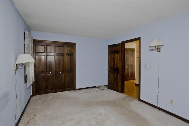 27 Chestnut Hill, South Hadley, MA 01075 - unfurnished bedroom featuring light carpet and a closet