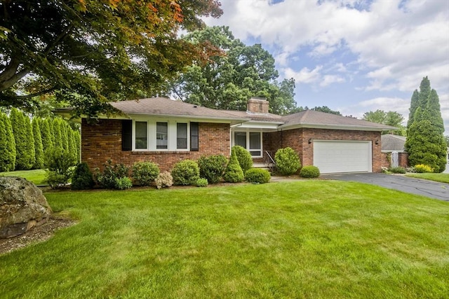 27 Chestnut Hill, South Hadley, MA 01075 - ranch-style house with a chimney, a garage, brick siding, and a front lawn