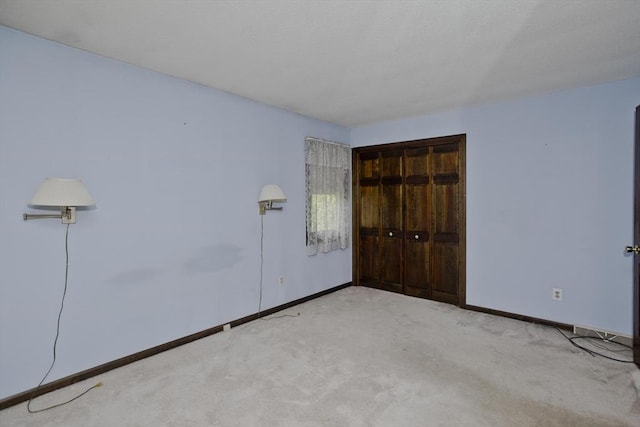 27 Chestnut Hill, South Hadley, MA 01075 - unfurnished bedroom featuring a closet and light carpet