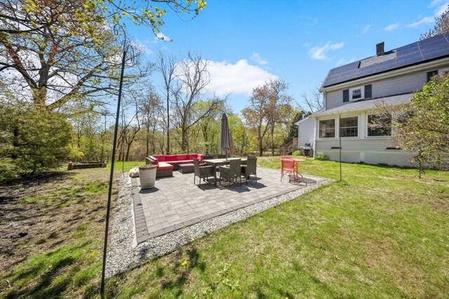 view of yard featuring a patio and an outdoor living space