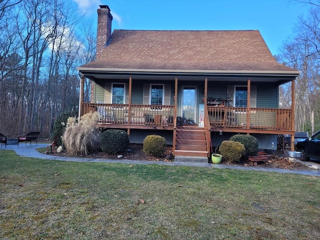 view of front of home featuring covered porch and a front lawn