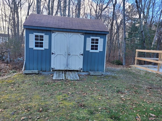 view of outdoor structure with a yard