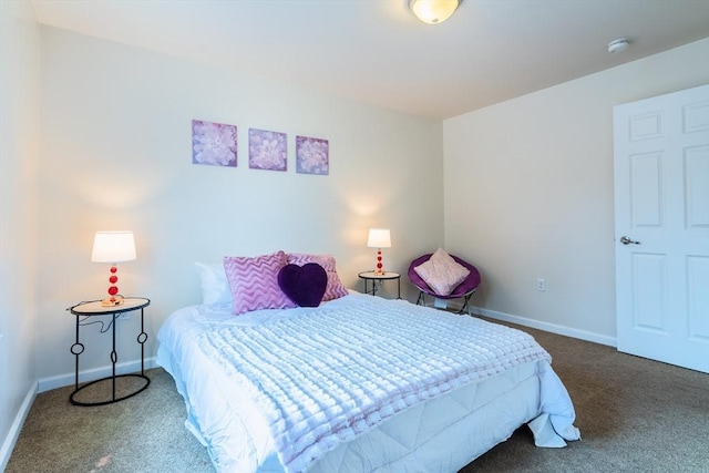 bedroom featuring baseboards and carpet floors