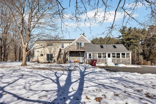 view of front of home featuring stairs