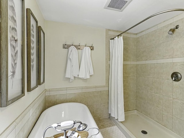 26 E St, Hopkinton, MA 01748 - full bathroom featuring tiled shower and a freestanding bath