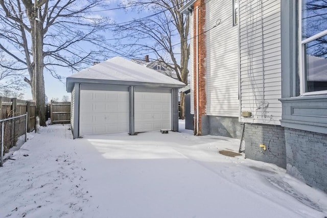 view of snow covered garage